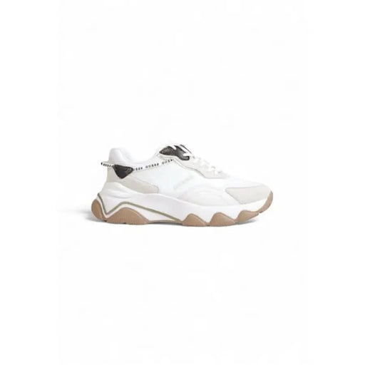 White chunky sneaker with brown sole from Guess, featuring rubber and textile composition