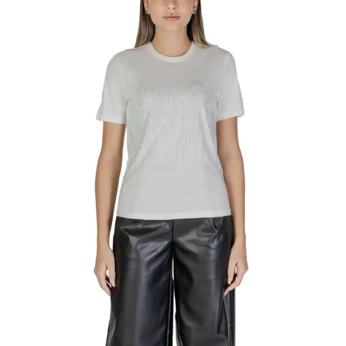 White crew neck t-shirt with black leather pants from Only Women’s Undershirt collection