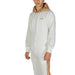 White hooded sweatshirt with fur-lined hood and matching sweatpants by Alviero Martini