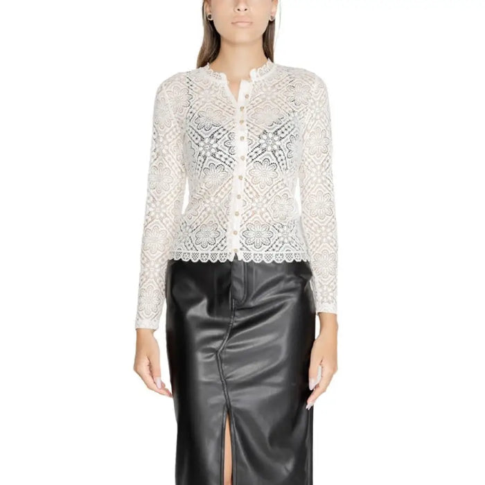 White lace button-up cardigan with long sleeves and floral pattern by Morgan De Toi