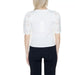 White lace-detailed top from Morgan De Toi, embodying urban city style