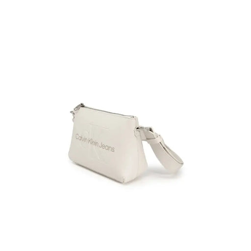 White leather Calvin Klein clutch handbag with wrist strap for women by Calvin Klein Jeans