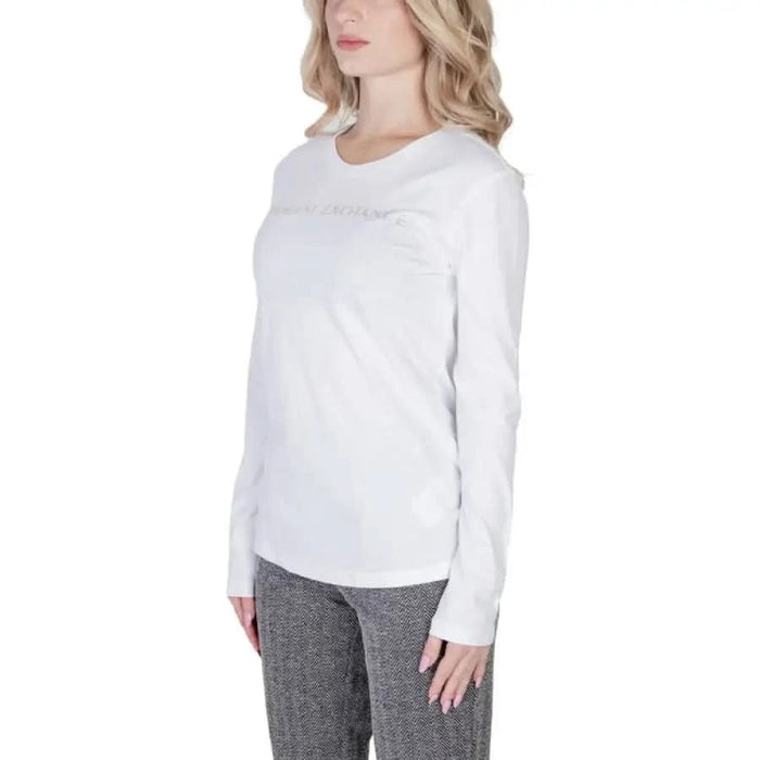 White long-sleeved cotton t-shirt paired with gray pants from Armani Exchange Women T-Shirt