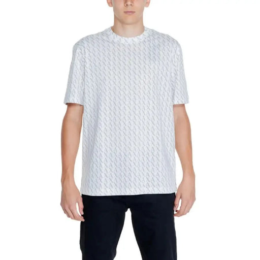 Woman wearing Armani Exchange white patterned short-sleeve t-shirt