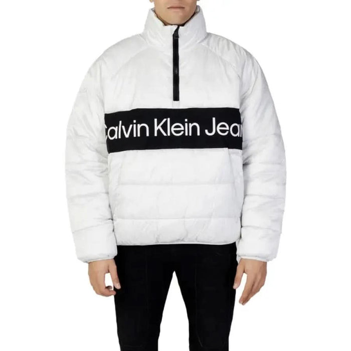 White puffer jacket featuring a black Calvin Klein Jeans logo band across the chest