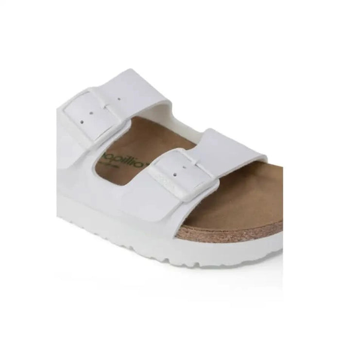 White sandal with two buckle straps and cork footbed from Birkenstock Women Sandals