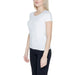 Blonde woman wearing Ea7 Women T-Shirt - white short-sleeved casual style