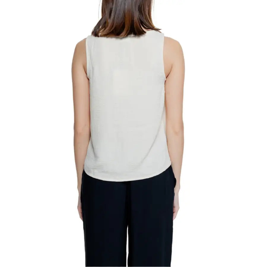 Jacqueline De Yong Women’s White Sleeveless Top with Dark Pants, Back View