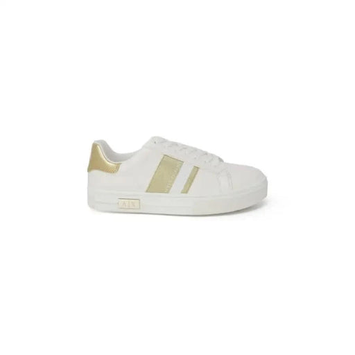 Armani Exchange Women’s white sneaker with gold accents and platform sole