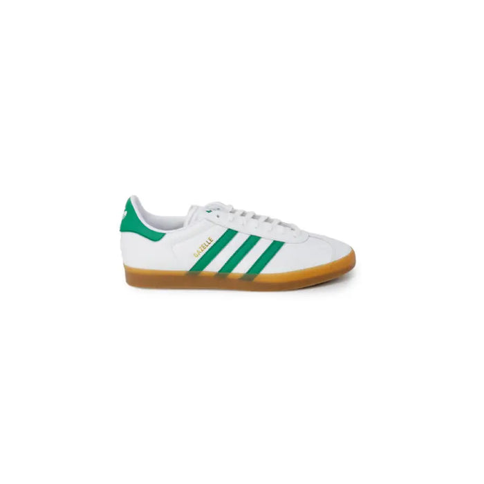 White Adidas men’s sneakers with green stripes and gum sole for stylish comfort