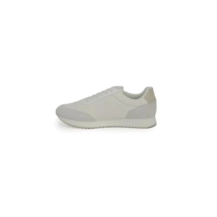 Calvin Klein Men Sneakers featuring a low-profile white sneaker with textured sole