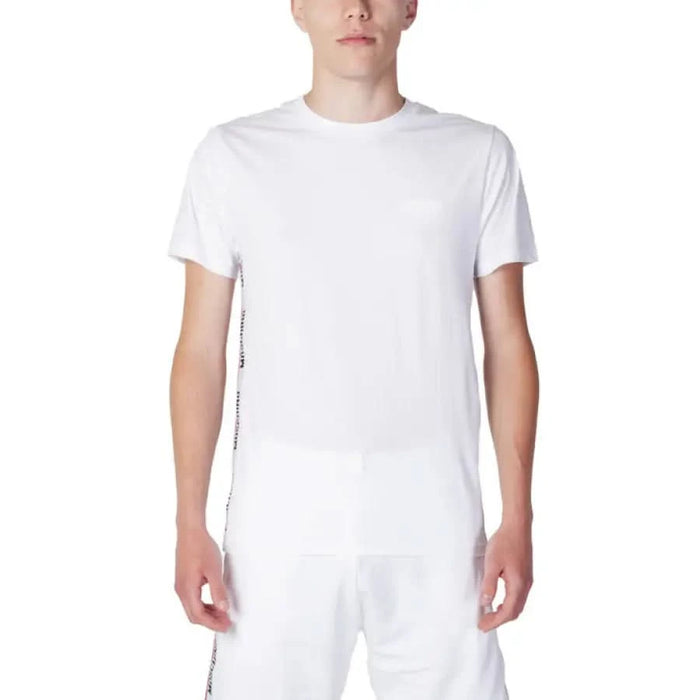 Person wearing a White Moschino Underwear Men T-Shirt displaying the product features