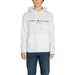 White Tommy Hilfiger hoodie with brand name and EST 1985 on front, featured in men sweatshirts