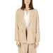 Woman in Sandro Ferrone beige coat and pants for the Sandro Ferrone Women Blazer product