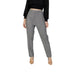 Model wearing Toi Morgan Women Trousers in black top and grey pants