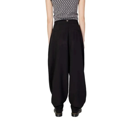 Aware Aware women wearing stylish Aware Women trousers in black with white top