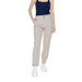 Woman in black tank top and beige Street One trousers showcasing urban city style