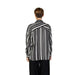 Woman in Only black and white striped women shirt, urban city fashion