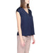 Urban Style: Woman in Blue Street One Blouse with Beige Pants - Trendy Women’s Clothing