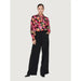 Urban style: Woman in floral blouse and wide pants - Jacqueline De Yong Women Blouse