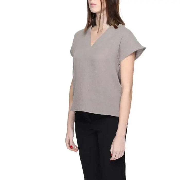 Yong Women Blouse by Jacqueline De Yong - woman in grey top and black pants