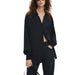 Woman in oversized black button-up shirt with long sleeves from Desigual