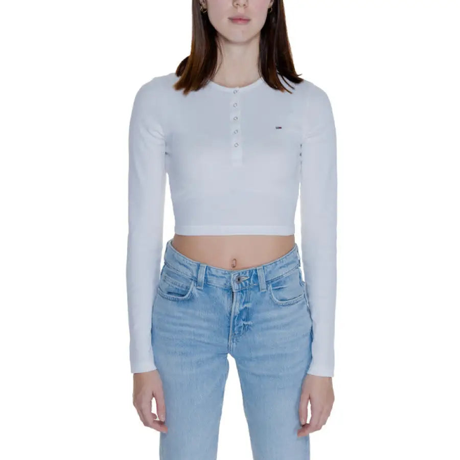 Woman in white cropped long-sleeve top and light blue jeans, Tommy Hilfiger Women’s T-Shirt