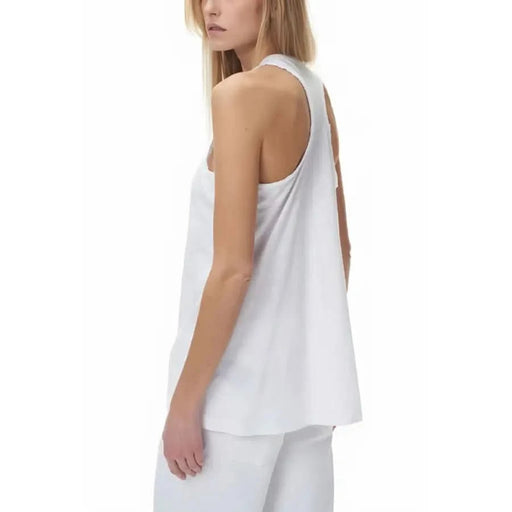 Blauer Blauer women in white undershirt and pants showcasing Blauer Women Undershirt