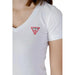 Guess women wearing Guess Women T-shirt with red triangle logo