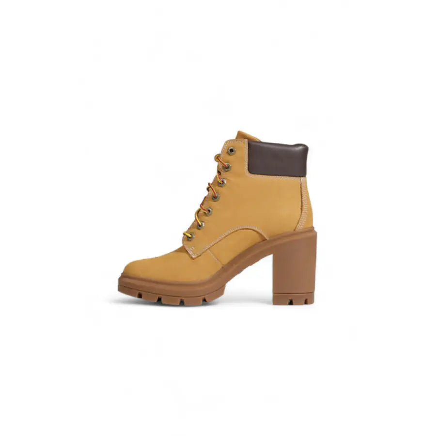 Yellow leather Timberland women’s ankle boot with chunky heel and lug sole